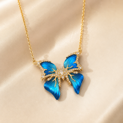 Blue Butterfly Pendant Necklace | Gold Tone Rhinestone Women’s Necklace by AMBERÉA